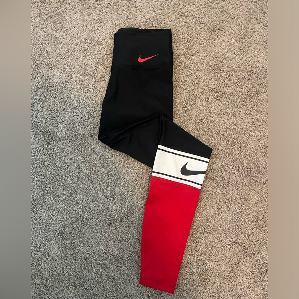 Nike Leggings with logo on leg. Size XS